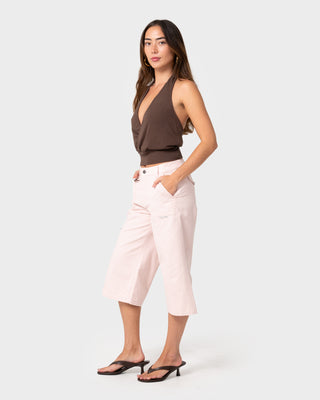 woman-wearing-it-gyrl-low-rise-capri-cargo-pant-in-pastel-pink