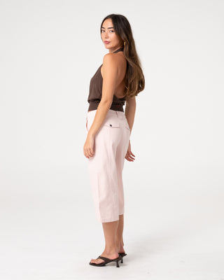Woman wearing It Gyrl Low Rise Capri Cargo Pant in Pastel Pink