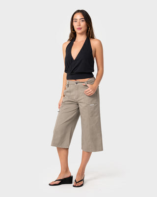 Woman wearing It Gyrl Low Rise Capri Cargo Pant in Vintage Khaki