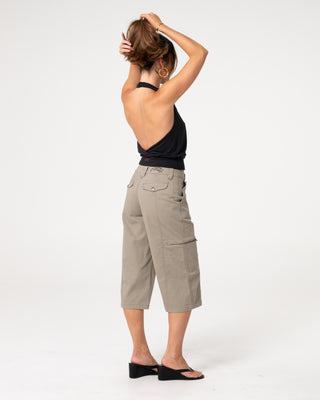 Woman wearing It Gyrl Low Rise Capri Cargo Pant in Vintage Khaki