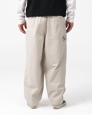 Man wearing Static Half Elastic Baggy Pant in Stone