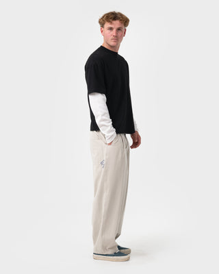 Man wearing Static Half Elastic Baggy Pant in Stone