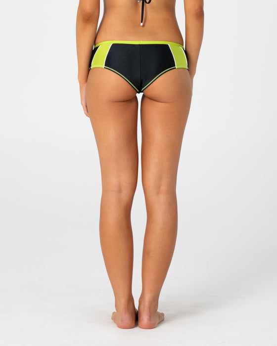 woman-wearing-voltron-bikini-booty-short-in-black-lime