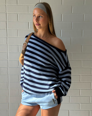Woman wearing Stella Stripe Slouch Knit in Navy Blue / Retro Blue