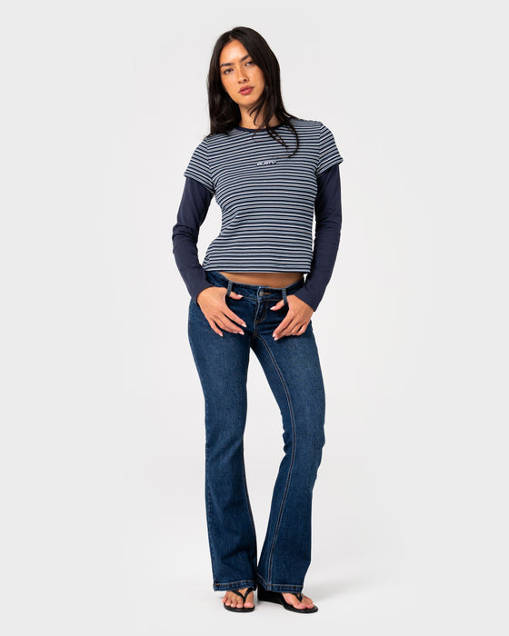 woman-wearing-18-degrees-mock-layer-stripe-tee-in-navy-blue