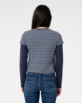 Woman wearing 18 Degrees Mock Layer Stripe Tee in Navy Blue