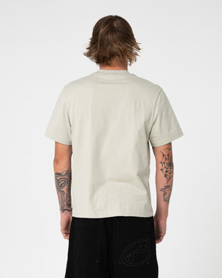 Man wearing Florilla Graphic Tee in Abbey Stone