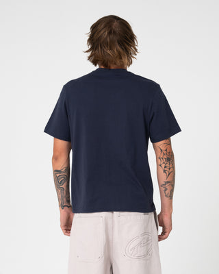 Man wearing Florilla Graphic Tee in Navy Blue