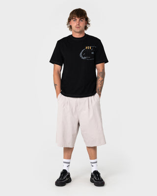 Man wearing Pop Shmoke Graphic Tee in Black