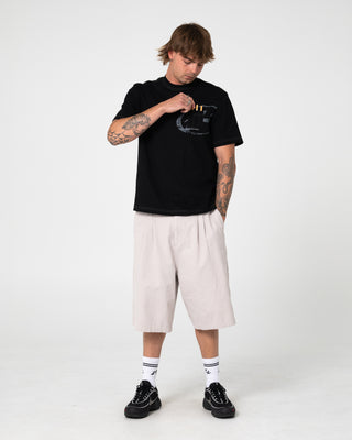 Man wearing Pop Shmoke Graphic Tee in Black