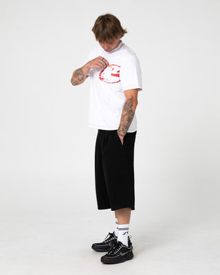 Man wearing Pop Shmoke Graphic Tee in White