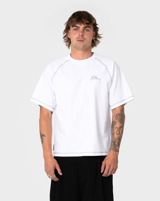 Man wearing Clarty B Raglan Tee in White
