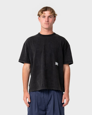 Man wearing Sosa Cropped Tee in Washed Black