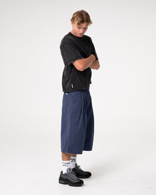 Man wearing Sosa Cropped Tee in Washed Black