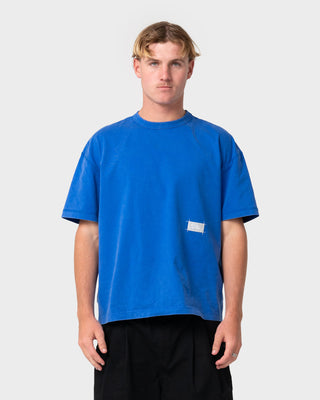 Man wearing Sosa Cropped Tee in Washed Royal Blue
