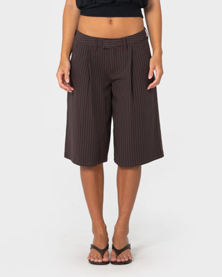 Woman wearing Big Bad Finance Mommy Low Rise Short in Java Pinstripe