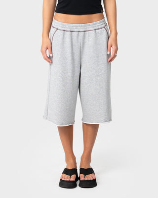 Woman wearing Servo Oversize Fleece Track Shorts in Grey Marle