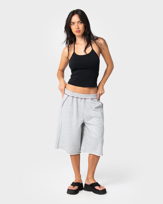 woman-wearing-servo-oversize-fleece-track-shorts-in-grey-marle