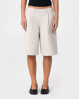 Woman wearing Clifford Low Rise Bermuda Short in Stone