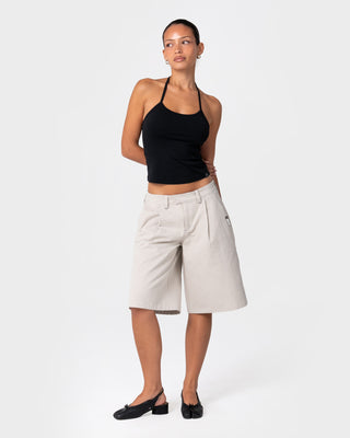 Woman wearing Clifford Low Rise Bermuda Short in Stone