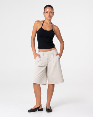 Woman wearing Clifford Low Rise Bermuda Short in Stone