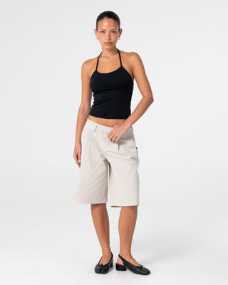 Woman wearing Clifford Low Rise Bermuda Short in Stone