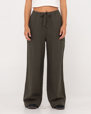 Woman wearing Carolina Pant in Dark Emerald