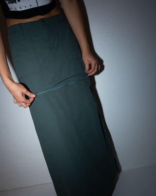 Woman wearing Billie Low Rise Ripstop Zip Off Skirt in Army