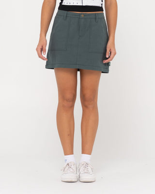Woman wearing Billie Low Rise Ripstop Zip Off Skirt in Army