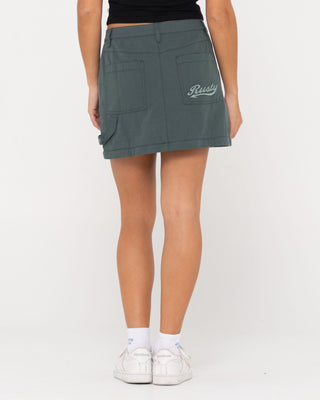 Woman wearing Billie Low Rise Ripstop Zip Off Skirt in Army