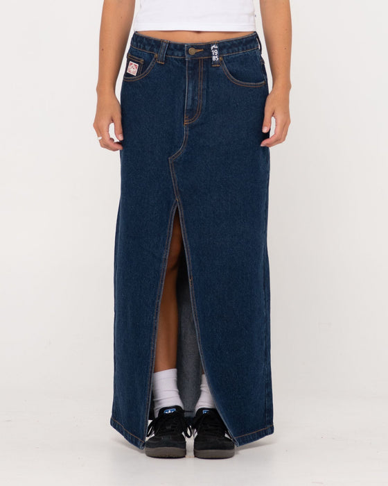 woman-wearing-celeste-low-rise-denim-maxi-skirt-in-deep-blue