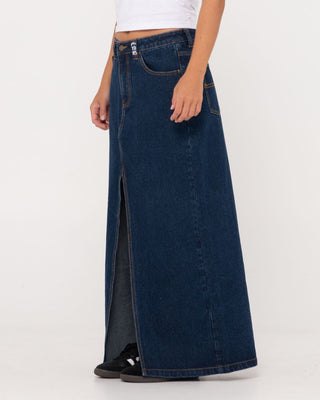 Woman wearing Celeste Low Rise Denim Maxi Skirt in Deep Blue
