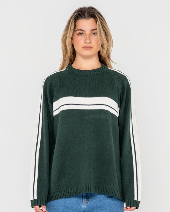 woman-wearing-white-lines-long-sleeve-crew-neck-knit-in-green-gables
