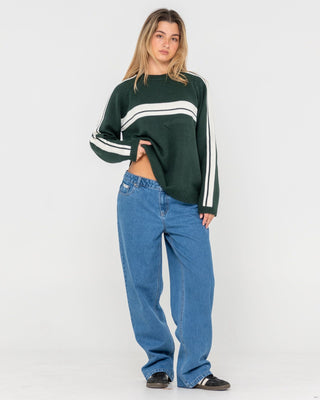 Woman wearing White Lines Long Sleeve Crew Neck Knit in Green Gables