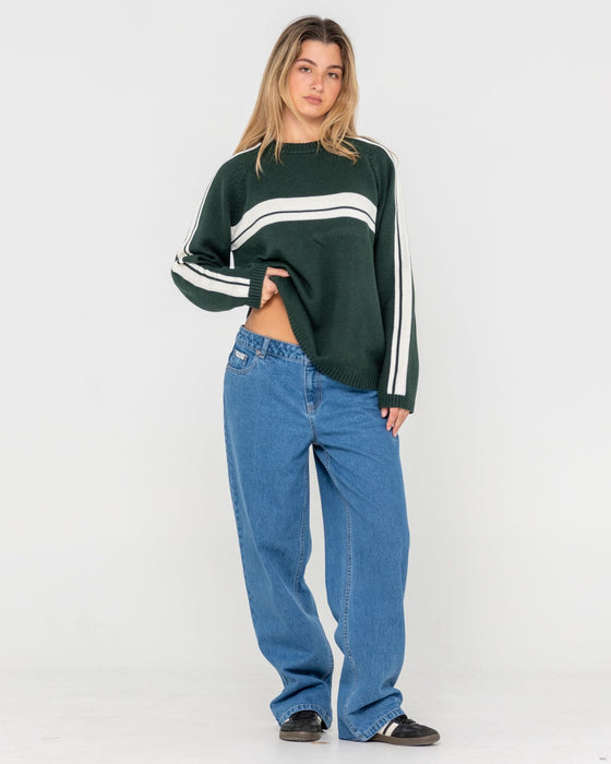 woman-wearing-white-lines-long-sleeve-crew-neck-knit-in-green-gables