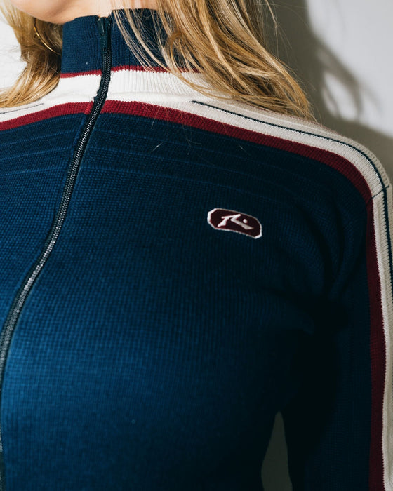 woman-wearing-daddy-gb-zip-through-skimmer-knit-in-navy-blue