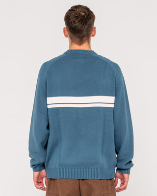 Man wearing White Lines 2.0 Knitted Crew in Atlantic Blue