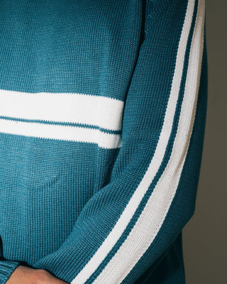 Man wearing White Lines 2.0 Knitted Crew in Atlantic Blue