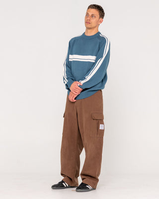 Man wearing White Lines 2.0 Knitted Crew in Atlantic Blue