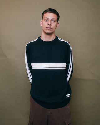 Man wearing White Lines 2.0 Knitted Crew in Black Marle