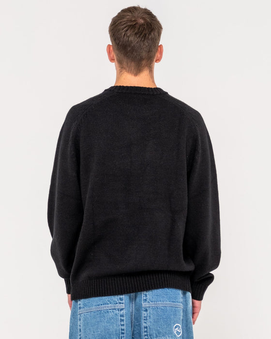 man-wearing-alpha-kappa-knitted-crew-in-black