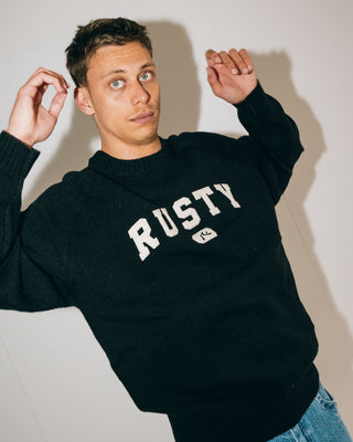 Man wearing Alpha Kappa Knitted Crew in Black