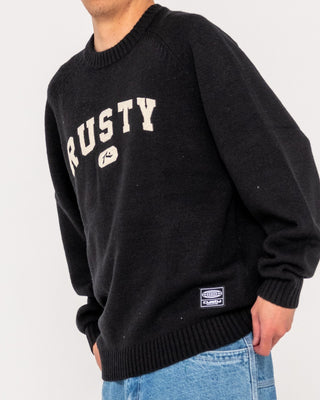 Man wearing Alpha Kappa Knitted Crew in Black