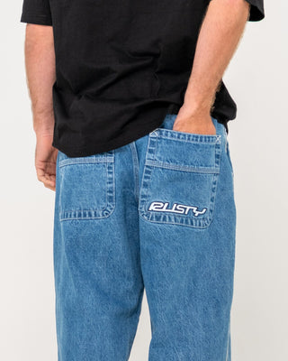 Man wearing Flip Daddy 2.0 Jean - Middy Blue in Middy Blue / Grey