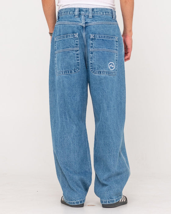 man-wearing-flip-daddy-tapeless-jean-middy-blue-in-middy-blue