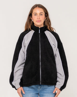 Woman wearing Two Tides Zip Through Sherpa Fleece in Black