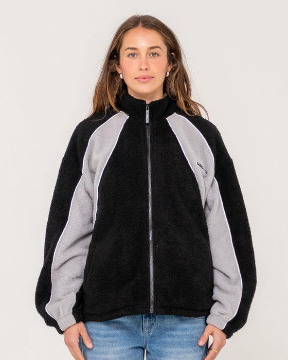 woman-wearing-two-tides-zip-through-sherpa-fleece-in-black