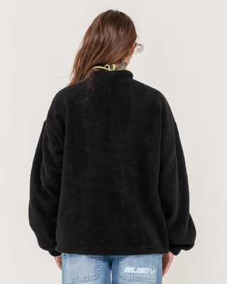 Woman wearing Two Tides Zip Through Sherpa Fleece in Black