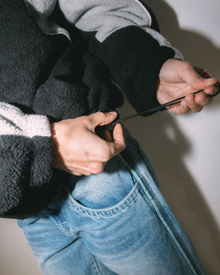 Woman wearing Two Tides Zip Through Sherpa Fleece in Black