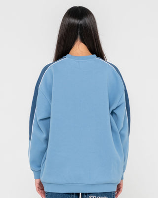 Woman wearing Two Timer Panelled Crew Fleece in Glacier Lake